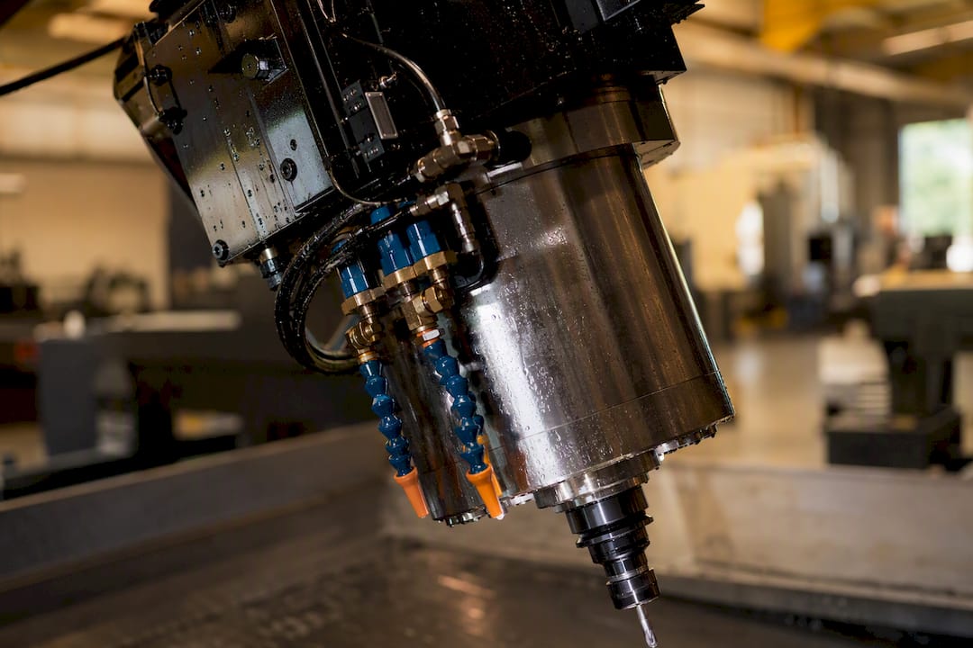 Liquid cooled CNC spindle with coolant connections