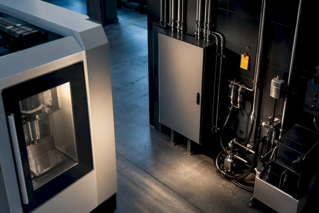 CNC machine and facility utilities in production hall